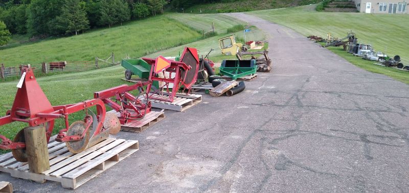 Farm equipment, plow and saw.