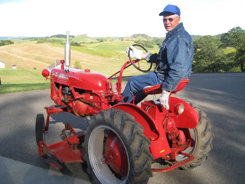 Douglas Fisk on a Farmall cub.