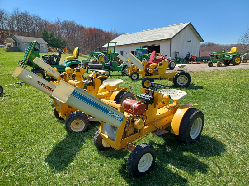 Antique International Harvester (IH) Cub Cadet lawn and garden tractors with their hoods up